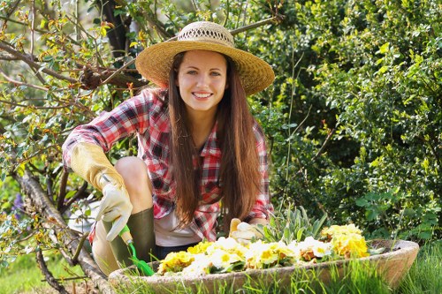Green waste being loaded for removal from a terrace garden